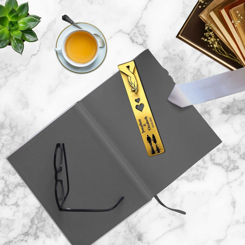 Personalised brass bookmark engraved with names and date, ideal 21st wedding anniversary gift in elegant gift box